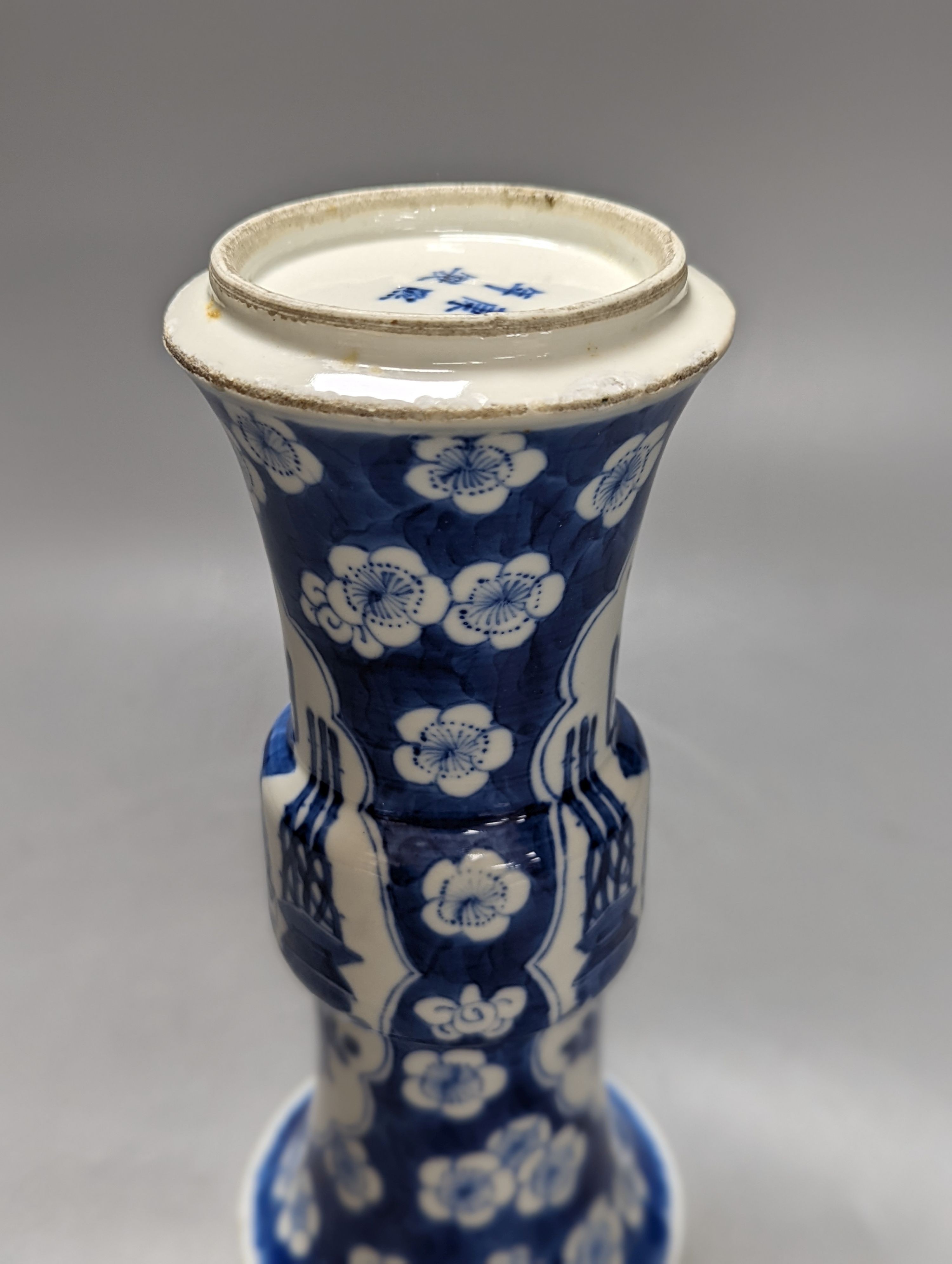 A 19th century Chinese blue and white prunus gu vase, 25 cms high.